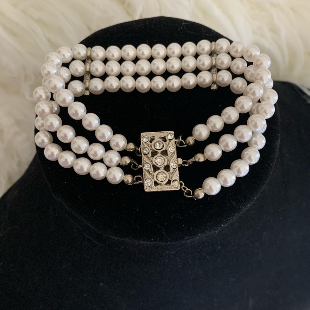 Costume jewelry!  Pearls and silver.